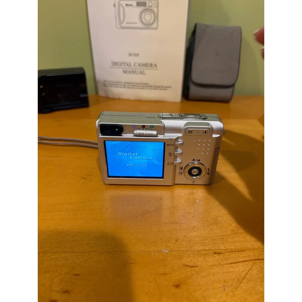 Norcent DC420 Digital Camera Silver 4.2MP 3x Optical Zoom Bundle with Charger
